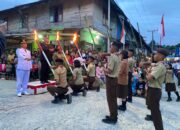 Uspika Parlilitan Gelar Taptu dan Pawai Obor Peringatan HUT RI Ke-81